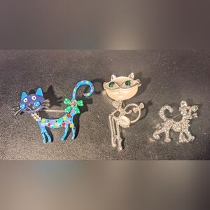 Whimsical Cat Brooch Set with Blue and Silver Accents